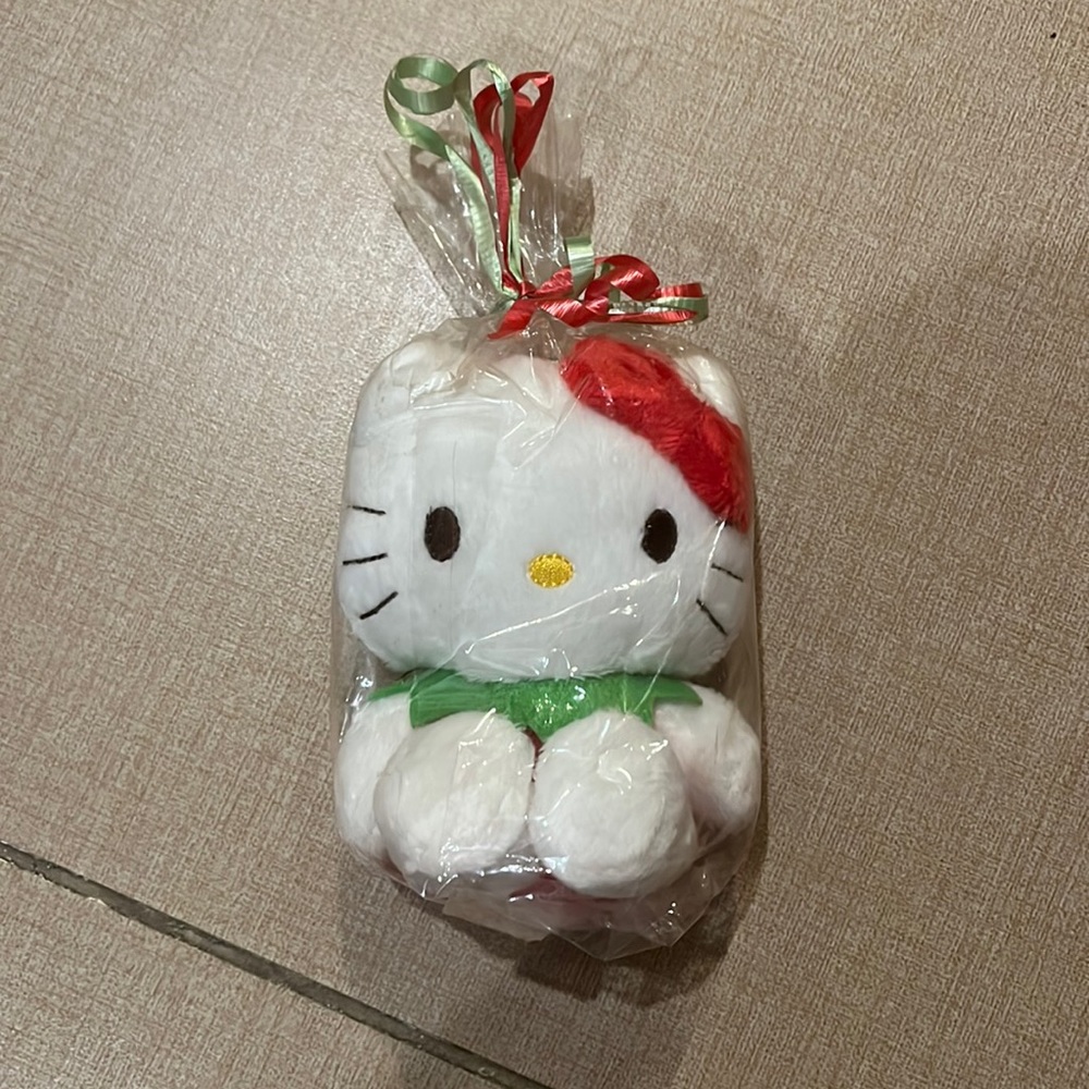 2 for/$20 Hello kitty in a strawberry costume
